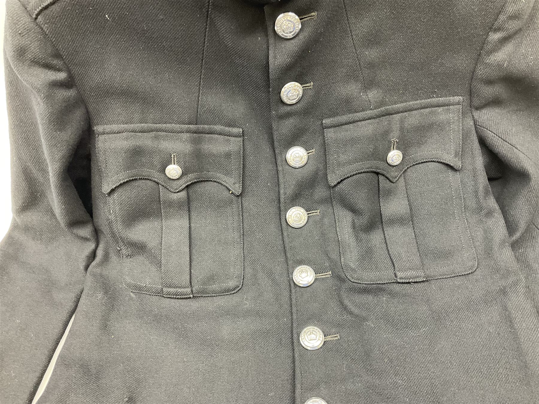Hull City Police - vintage tunic with matching cape, collar no.H460; another tunic with WW2 medal ribbon bar; early sergeant's tunic; and later sergeant's tunic (5)