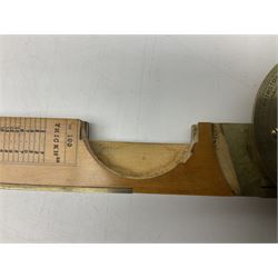 Late 19th/early 20th century boxwood and brass clinometer rule by Stanley, with inset magnetic compass, screw action protractor hinge divided to one degree with rise in inches per yard scale under, spirit level to one edge, marked 'W.F. Stanley Great Turnstile Holborn' with tables of distances, angles and thickness H16cm closed: in original leather covered case with instructions