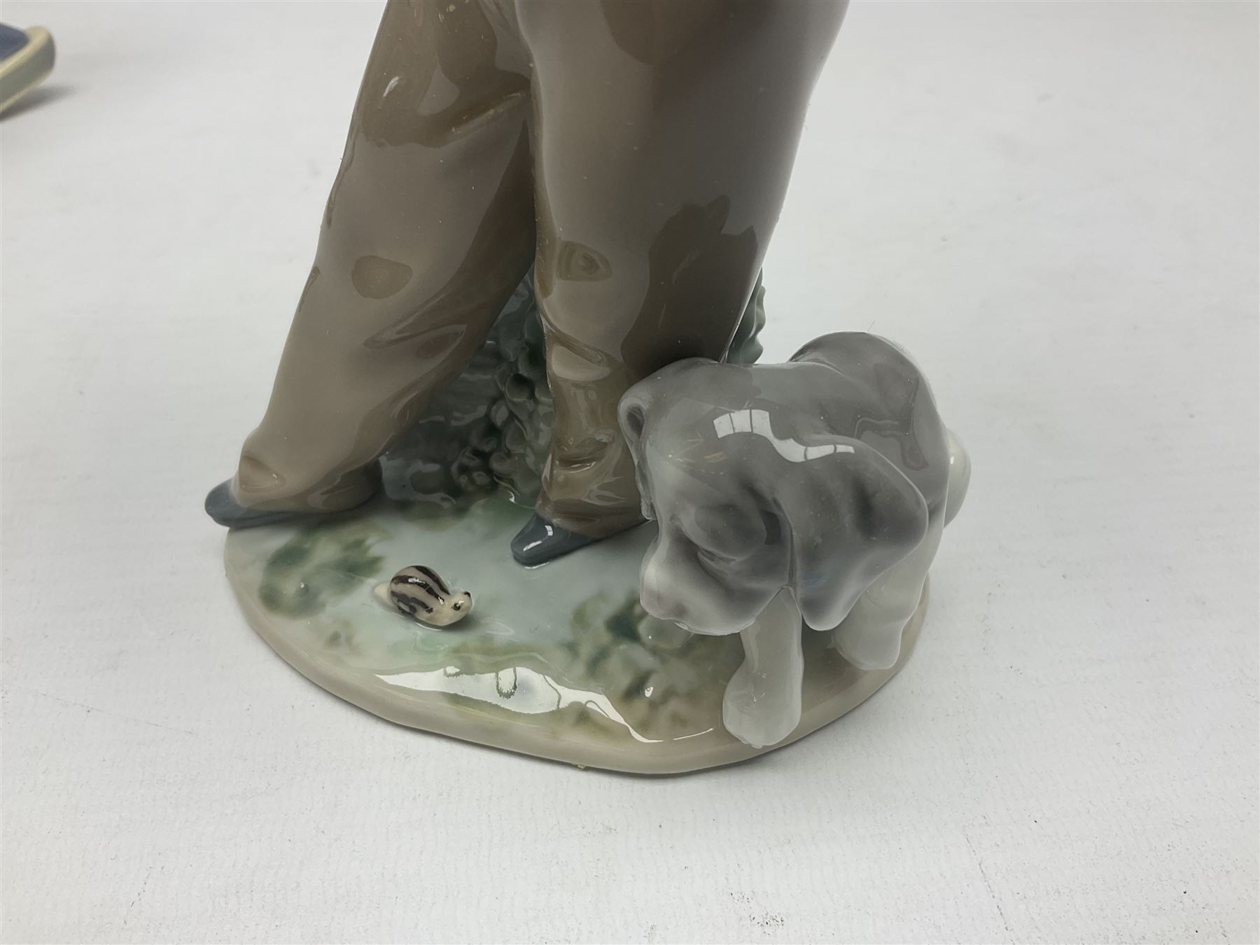 Three Lladro figures, Faithful Steed no 5769, Best Foot Forward no 5738 and Lambkins no 5469, all with original boxes, largest example H21cm 