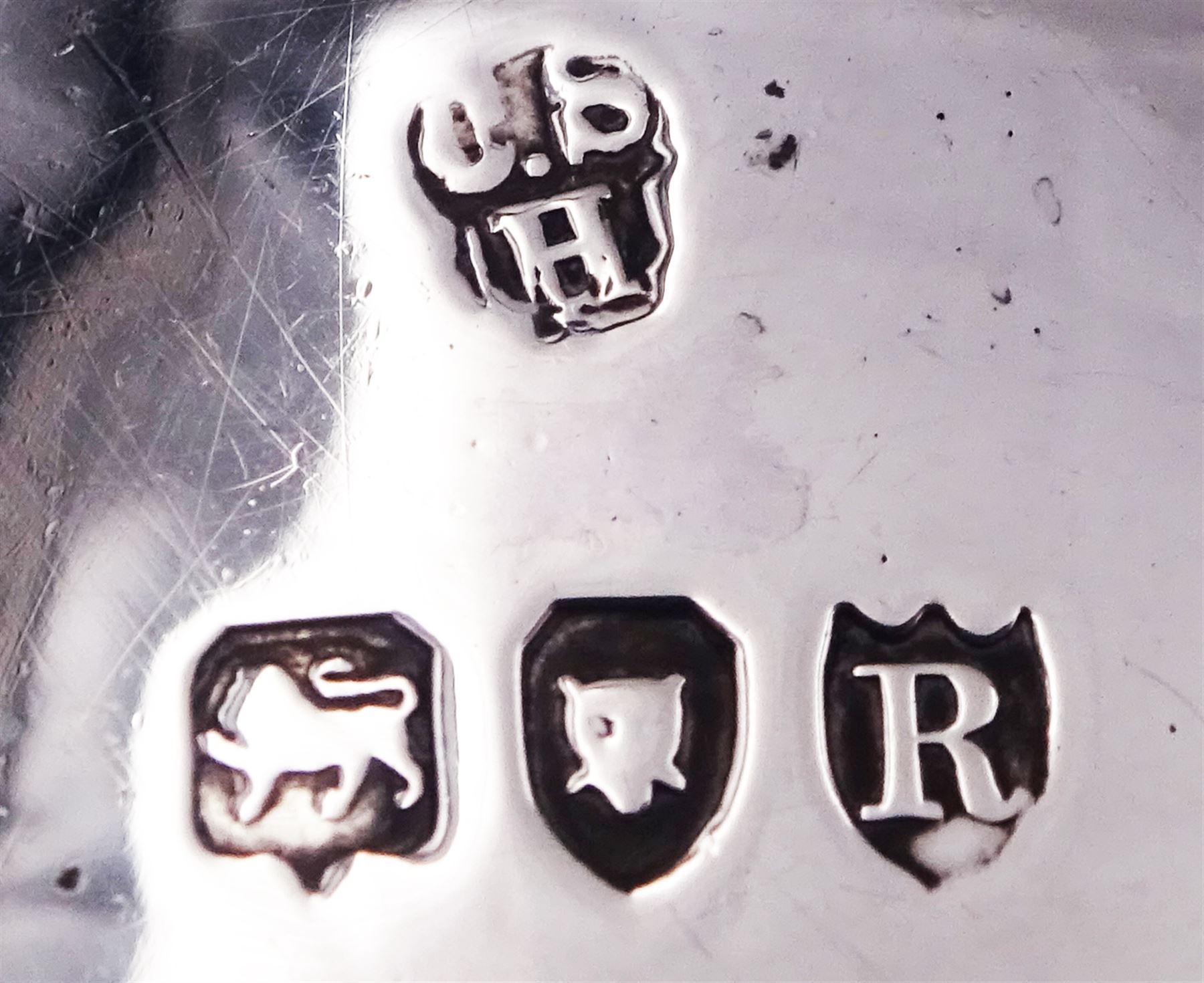 Pair of Victorian silver open salts, each of cauldron form with gadrooned rims and embossed flower heads to body, upon three paw feet, hallmarked Charles Stuart Harris, London 1892, approximate weight 3.05 ozt (95 grams)