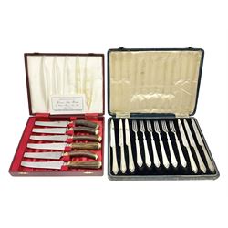 Set of six stag horn handled knives by Cooper Brothers and Sons, together with a set of silver plated dessert knives and forks for six place settings, both within fitted cases