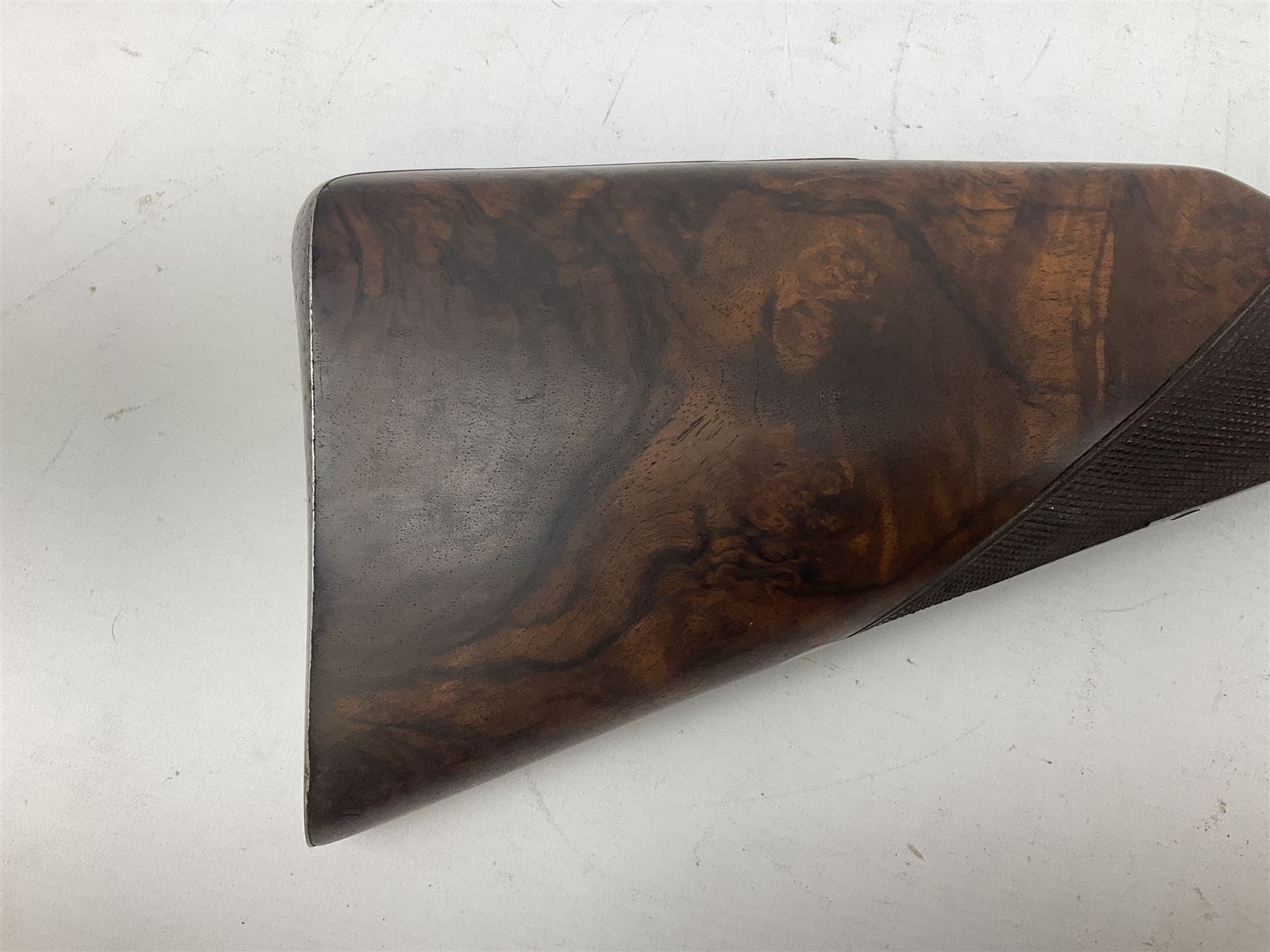 19th century John Jefferson of Scarborough 6-bore (modern 4-bore) double barrel side-by-side percussion gun, with 81cm stub twist damascus barrels (no provision for ramrod), well figured walnut stock with fine chequered grip and fore-end with horn tip and steel butt plate with long tang, well engraved lock and hammers with half-cock safeties on both sides, barrel sling swivel but rear sling swivel removed and replaced with silver escutcheon, London proofmarks, NVN, L128cm