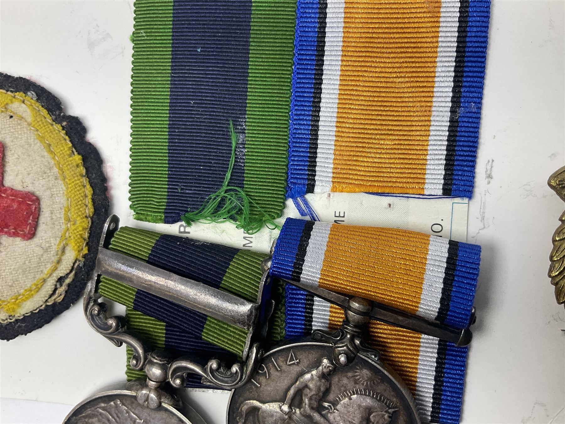 George V India General Service Medal with Afghanistan N.W.F. 1919 clasp and WW1 British War Medal awarded to 79561 Pte. R.D. Rowbottom R.A.M.C.; both with ribbons; card mounted with cap badge and Medical Corps cloth badge