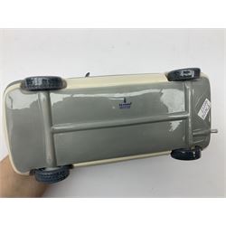 Lladro figure, Ford Fiesta, modelled as a Ford in beige, special commission by the Ford factory in Valencia, original box, no 7608, year issued 1989, year retired 1989, H9cm 