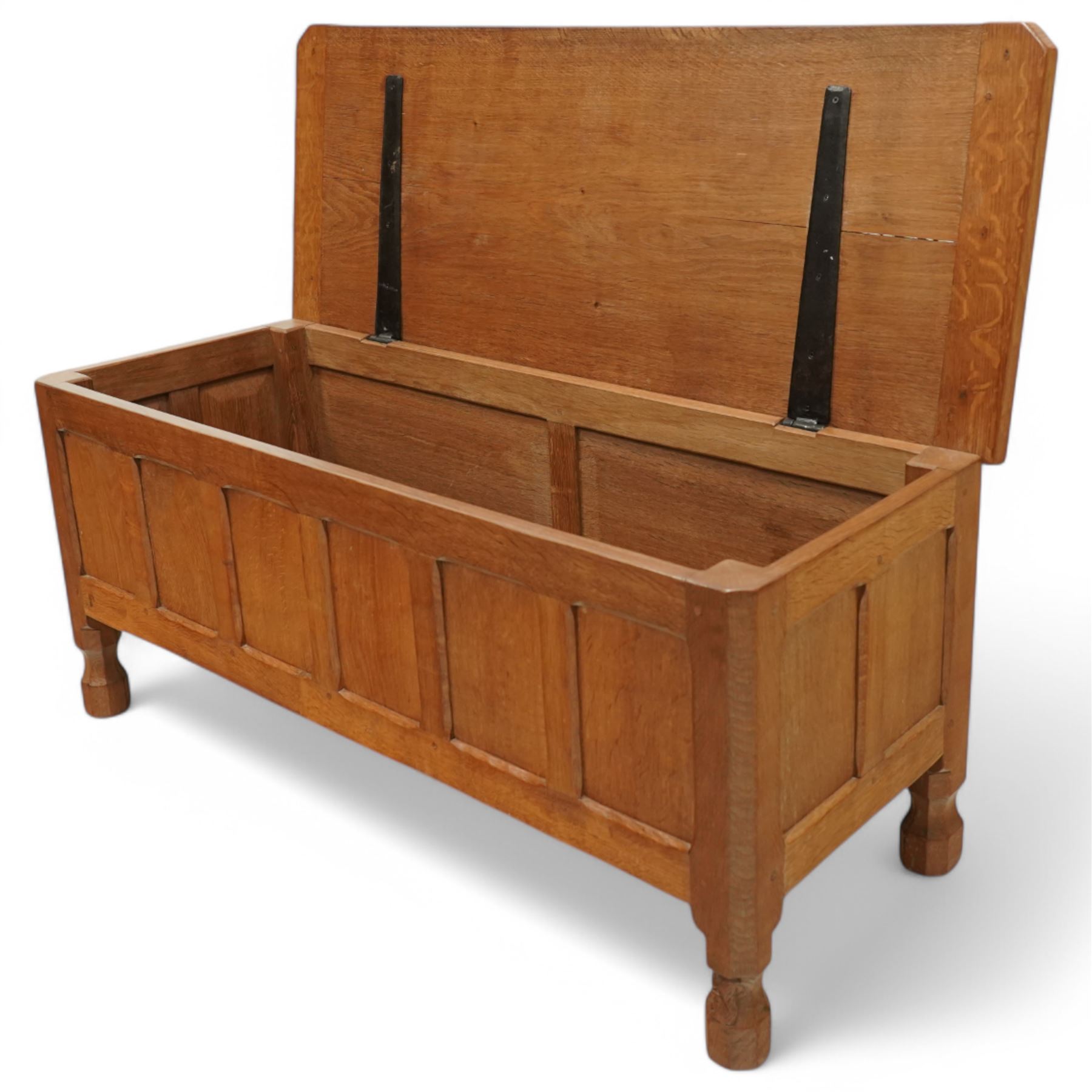 Squirrelman - oak six panel blanket box, on octagonal feet, squirrelman carving on the feet by Wilfred Hutchinson, Husthwaite, Thirsk