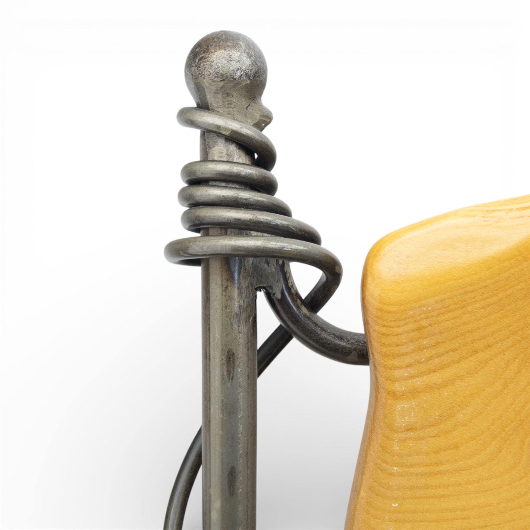 Paul Hodgkiss Designs of Glasgow - contemporary shaped elm dining table with wrought iron base; with set ten (8+2) matching high-back dining chairs, table of organic form above an elaborate wrought iron supports, with central elm stretcher, the chairs with en suite with matching wrought iron work burred elm headrest, purple velour upholstery with drop in seat     

Table: W 102cm, L 243cm, H 74cm
Chairs: W 56cm, D 52cm, H 130cm