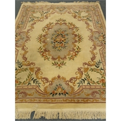  Chinese beige ground woollen rug carpet, central medallion, repeating floral border, 300cm x 245cm  