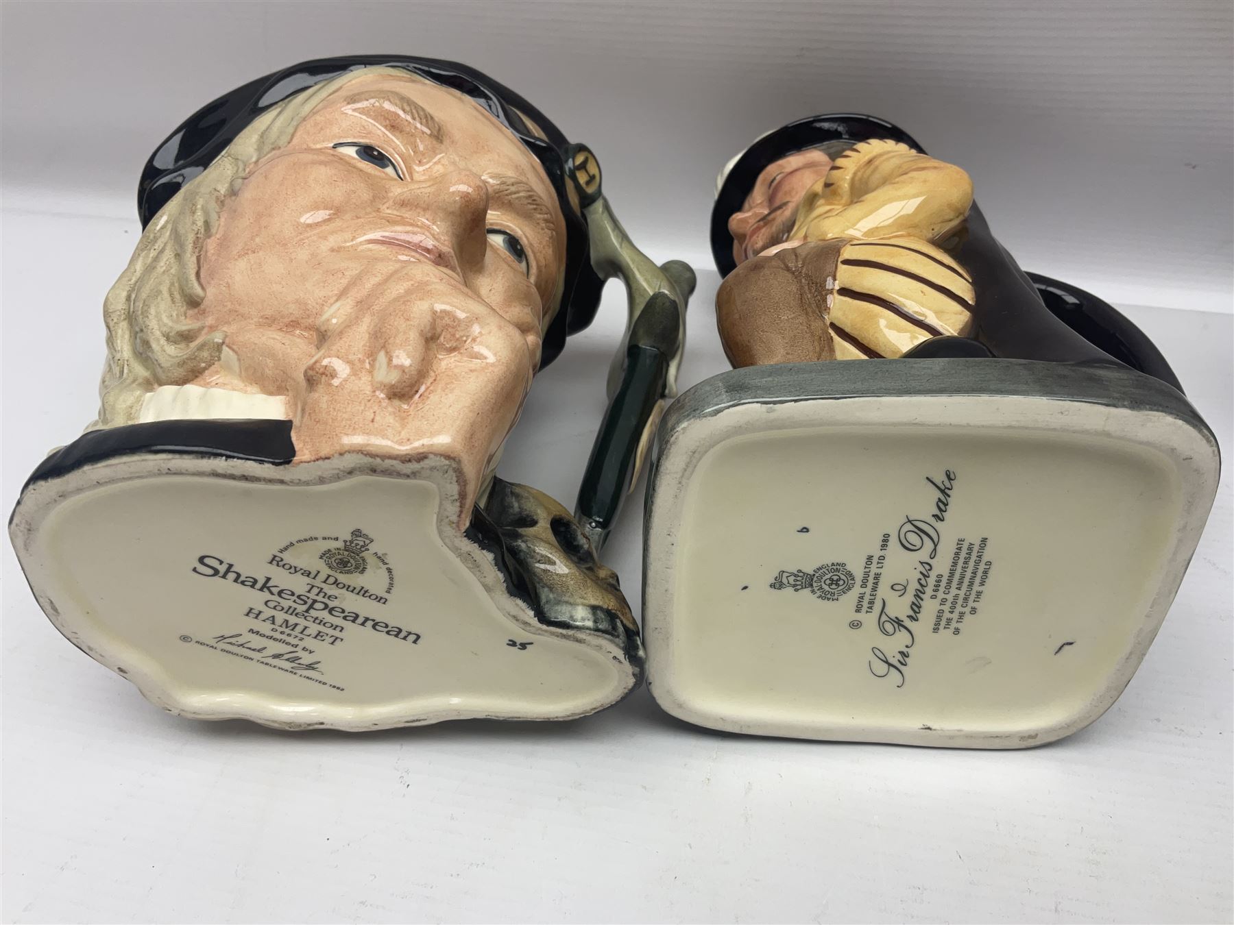 Eight Royal Doulton character jugs, including St George D6618, Guardsman D6568, The Juggler D6835 etc, together with Royal Doulton toby jug Sir Francis Drake D6660