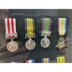 Limited edition large framed display board with sixty half-size copies of British Gallantry and Campaign Medals produced by Danbury Mint; all with ribbons and associated booklet