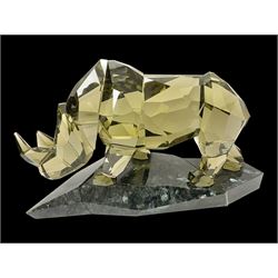 Swarovski Crystal Soulmates, Rhinoceros, with smoky brown tint standing on a black base, H16cm 