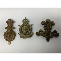 Nineteen Yeomanry metal cap badges including Derbyshire, Northamptonshire, Essex, Glamorgan, Staffordshire, City of London, Surrey, Shropshire, Hertfordshire etc; together with eleven Fusiliers badges including Lancashire, Royal Welch, Northumberland etc (30)