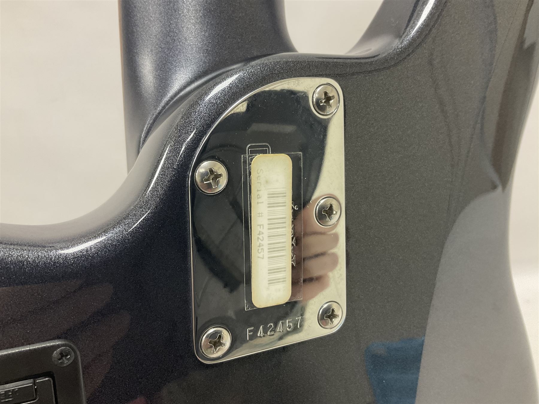 Music Man Bongo 4 string bass guitar, in sapphire black finish, serial no F42547, in black Music Man hard case, guitar L113cm