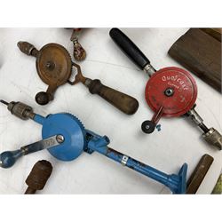 Quantity of woodworking tools, comprising hand drills to include Stanley No. 803 and No. 5803, Qualcast Clipper etc, together with collection of planes to include moulding examples and rebate plane of stepped form, and further tools including chisels etc