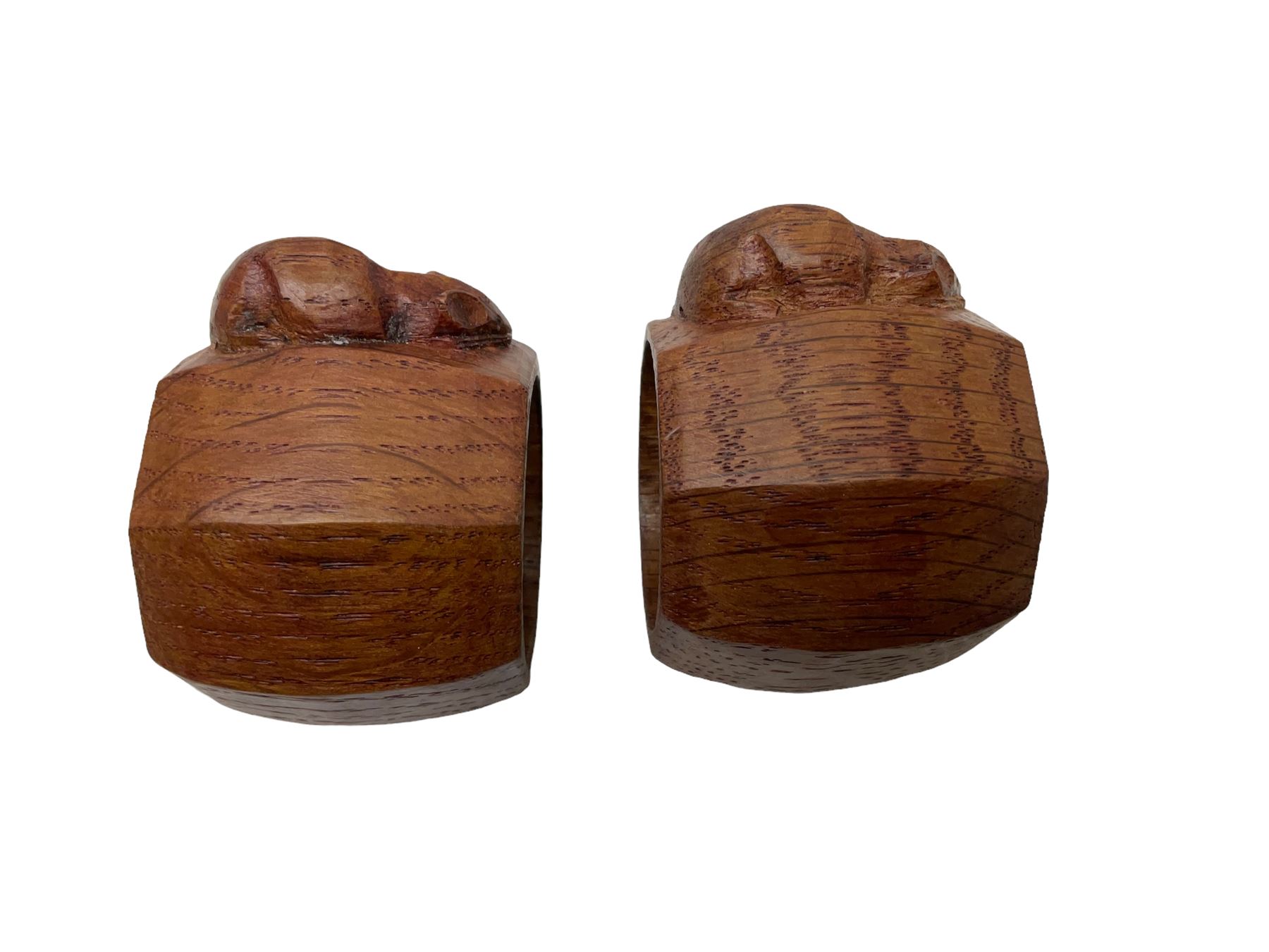 Mouseman - pair of oak napkin rings, of bulbous octagonal form each carved with mouse signature, by the workshop of Robert Thompson, Kilburn, L4cm W6cm
