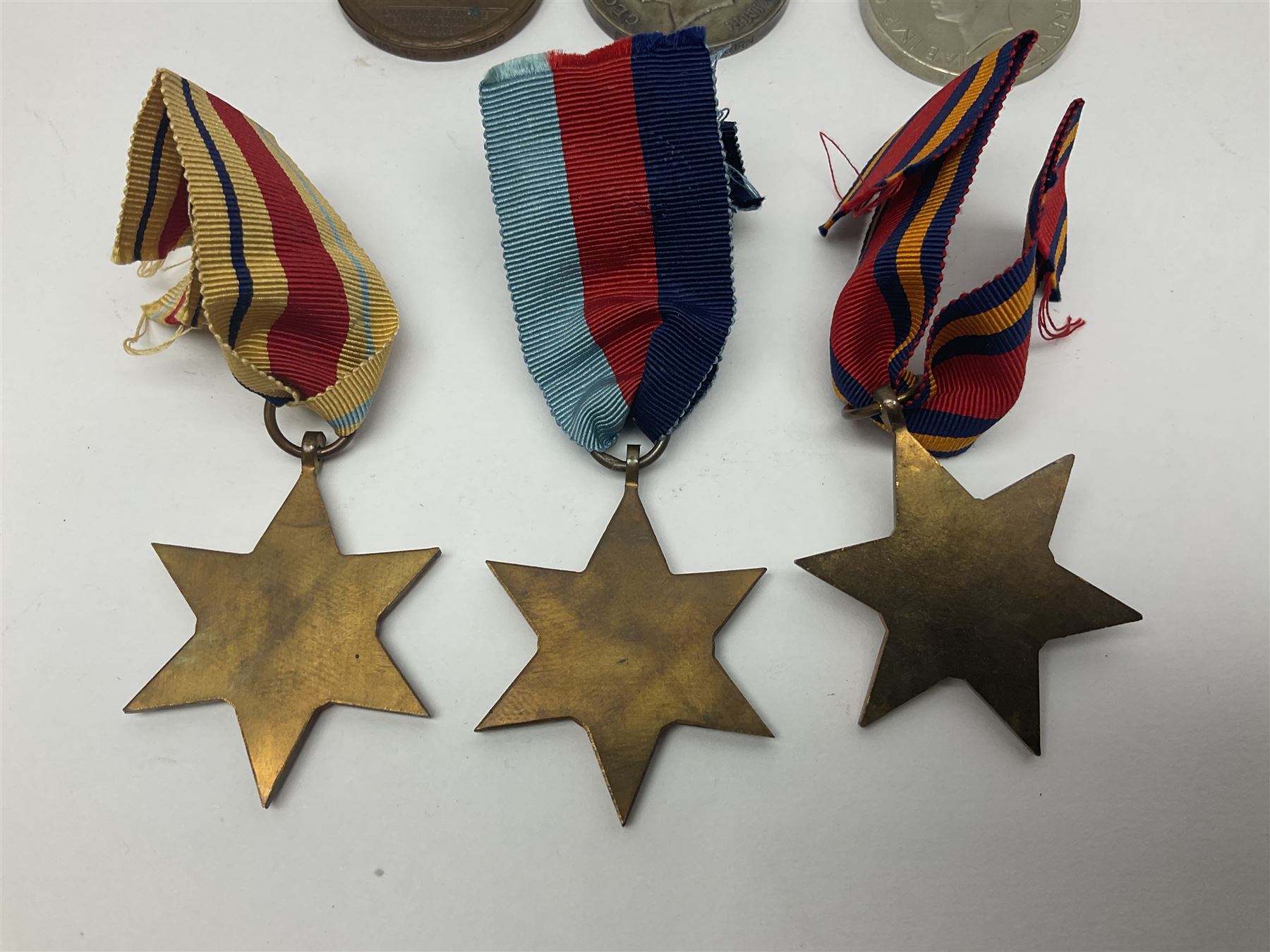 WW1 pair of medals comprising British war medal and Victory Medal awarded to 19774 Pte. G. Headlam Sea. Highrs.; another WW1 pair of medals comprising British War Medal and Mercantile Marine Medal awarded to Charles Filburn; WW2 group of five medals comprising 1939-45 War Medal, Defence Medal, 1939-45 Star, Africa Star and Burma Star; in issue box addressed to Mr. H, Smithson with medal slip; all with ribbons; and Edward VIII Coronation medal (10)