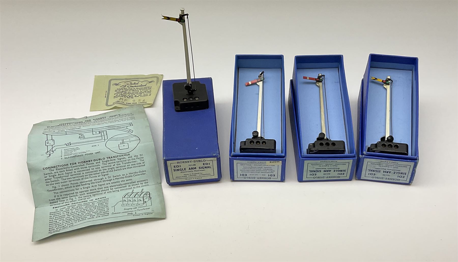 Hornby Dublo - twelve electric semaphore signals comprising four ED1 Single Arm; two ED2 Double Arm; one ED3 Junction Signal Upper Quadrant; one 5045 Colour Light Signal - Single (Home); two ES6 Colour Light Signal -Single (Distant); and two 5047 Colour Light Signal - Junction (Home); all boxed (12)