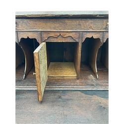 Georgian oak bureau, fall front enclosing fitted interior, four long graduating drawers, on bracket feet
