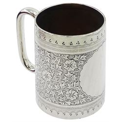 Victorian silver christening mug, of tapering cylindrical form with loop handle, the body with vacant scalloped panel against a foliate engraved band, hallmarked Hilliard & Thomason, Birmingham 1890, H9cm, contained within a fitted case with pink silk and burgundy velvet lined interior, approximate silver weight 4.75 ozt (147.8 grams)