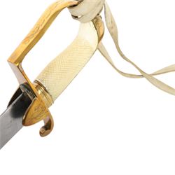British 1976 pattern cavalry officers' saber variation of  private purchase, the 76cm single edged blade extremely curved, brass stirrup hilt with chequered ivory grip the languets bearing military trophies, with original buck skin sword knot, the leather scabbard has three brass mounts with twin suspension rings, the top mount bears makers cartouche of 'Tatham to his Majesty, Charing Cross London', 1800-1860, overall L90cm  This item has been registered for sale under Section 10 of the APHA Ivory Act 