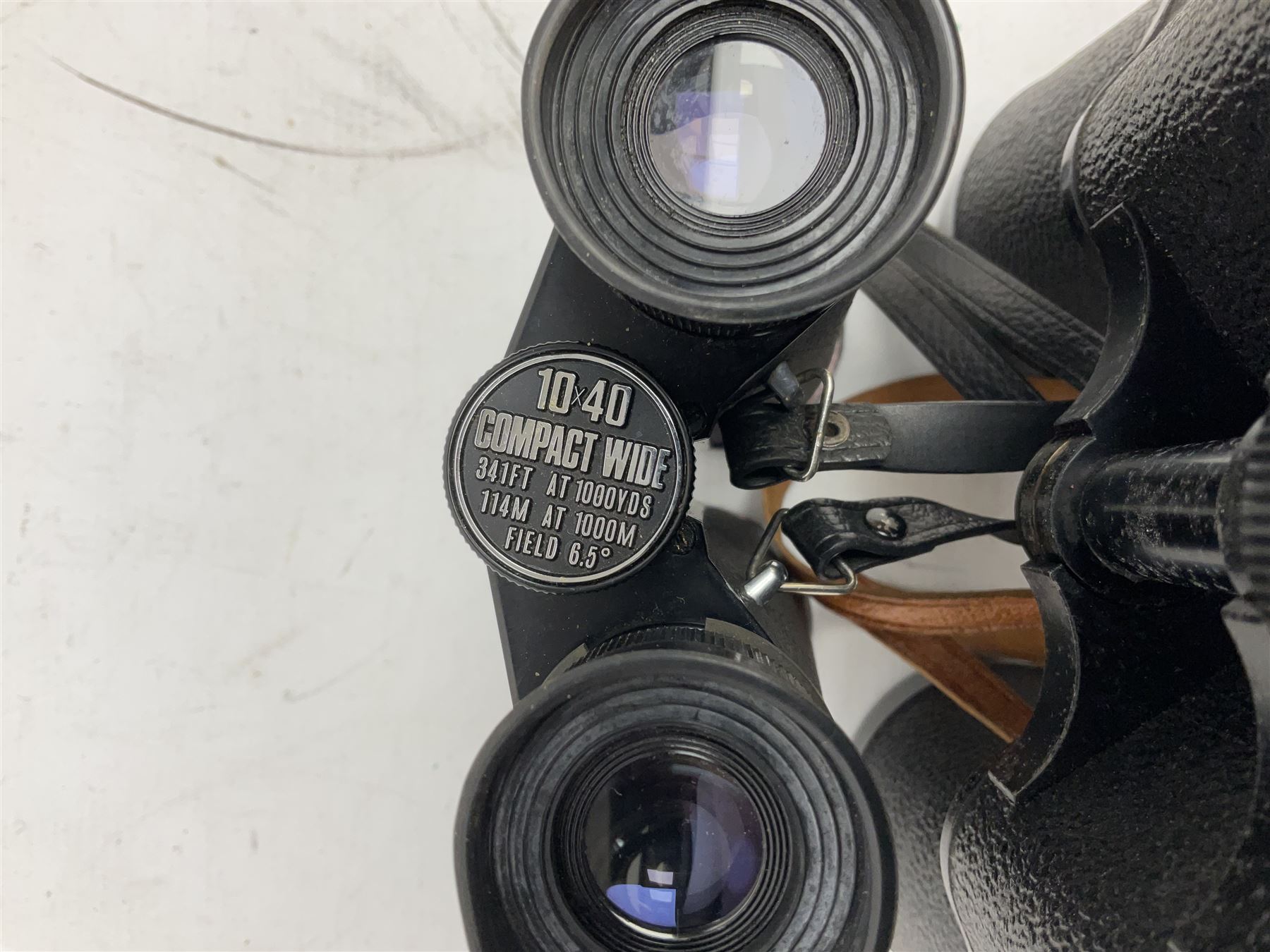 Nine cased pairs of binoculars, to include Embassy 8x40, Tasco 7x35, Zenith 10x50 Field. Opticron 10x50, Swift 8x40 Grand Prix Mk I, etc