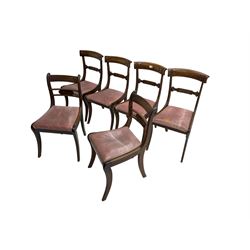Set four late regency mahogany dining chairs, cresting rail carved with shell decoration, reeded centre rail with flanking lobe carving, upholstered seats with reeded seat rail, on sabre supports; pair regency mahogany dining chairs, carved cresting and centre rails with upholstered seats, raised on sabre supports