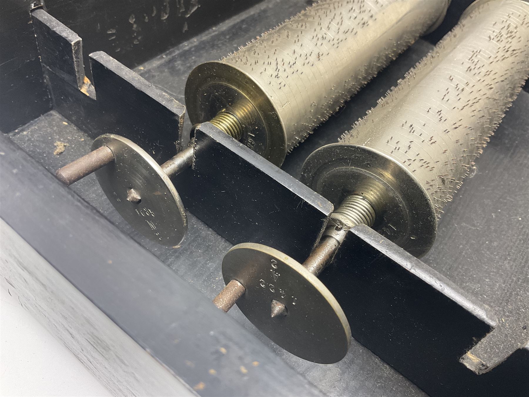 Swiss - 19th-century cylinder music box with three butterfly bells in sight, in a mahogany case with two separately boxed  6” cylinders, glazed viewing lid, 41 tooth comb (one tooth broken) crank key missing, movement untested.