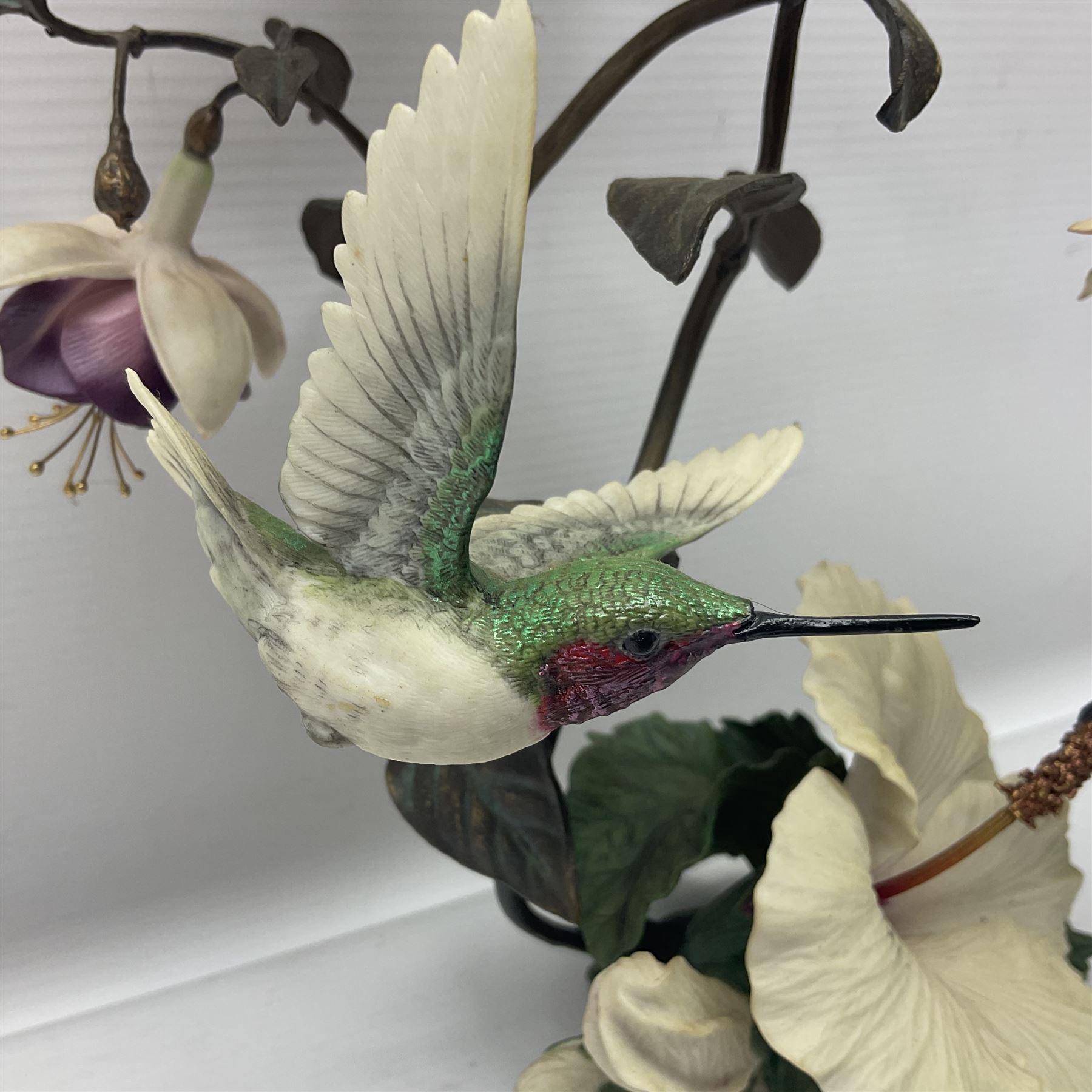 Franklin Mint House of Faberge, four humming bird figure groups, comprising Flight of Fancy, Beauty in Bloom, Splendor in the garden and The Enriched Garden, largest H35cm
