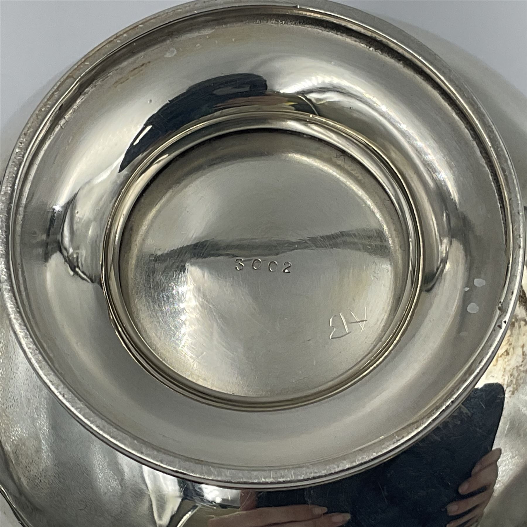 1920s five-piece silver tea service, comprising teapot, coffee pot, hot water pot, twin handled open sucrier and milk jug, each of squat circular form with shaped rim, the teapot, coffee pot and hot water pot each with ebonised handle and finial, the sucrier and milk jug with acanthus capped scroll handles, all upon circular foot, hallmarked R F Mosley & Co, Sheffield 1926 & 1927, tallest H24cm