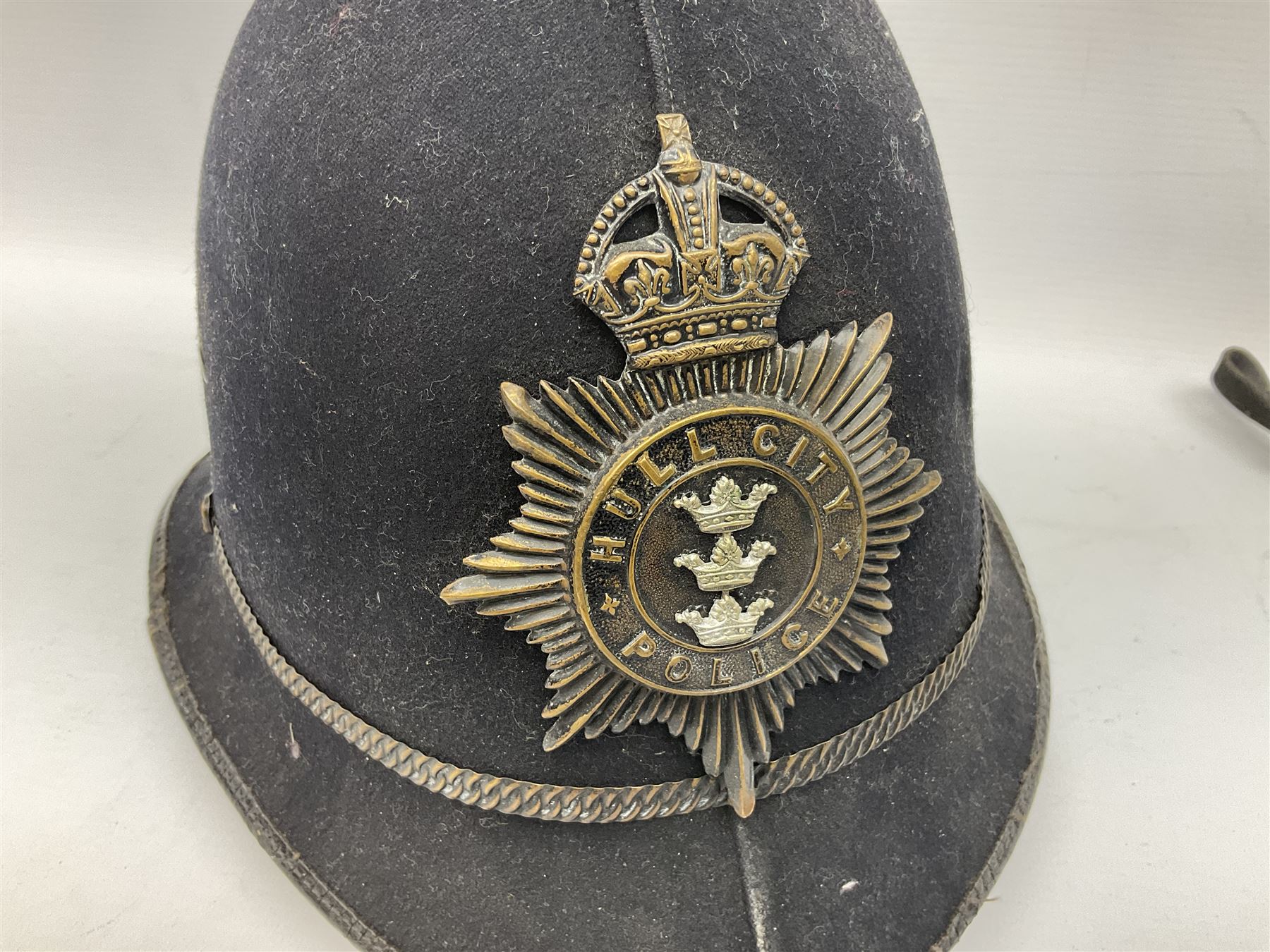 Hull City Police - Christy's London helmet with king's crown plate and an Oldham & Son Ltd Denton Manchester Type T.D.I.A. chromium cased safety torch (2)  
