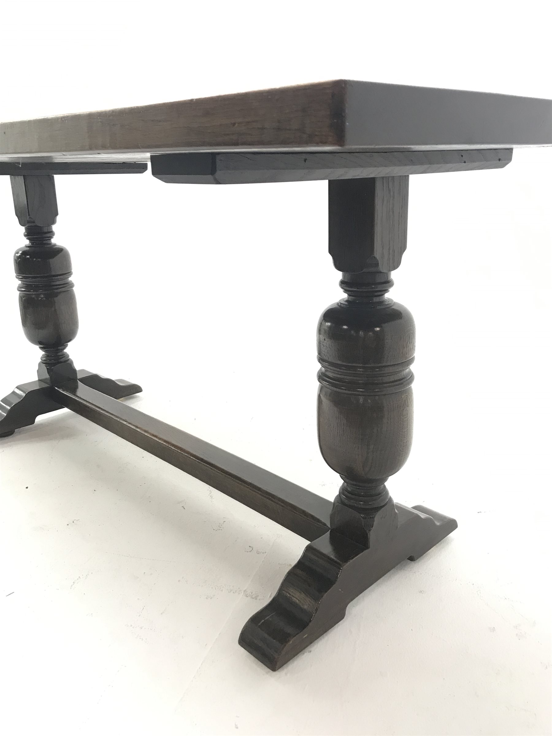  20th century oak refectory table, on two cup and cover baluster supports connected by stretcher, 169cm x 81cm, H78cm  
