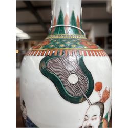 Chinese Kangxi famille verte vase of baluster form with fluted rim, decorated with sage and attendants within a trellis border, with four character Kangxi double ring mark beneath, H31cm 
