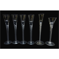  Georgian style wine glass, conical bowl on double opaque twist stem H23cm, another with double air twist stem and a set of four with conical bowls on spiral incised type stems (6)  