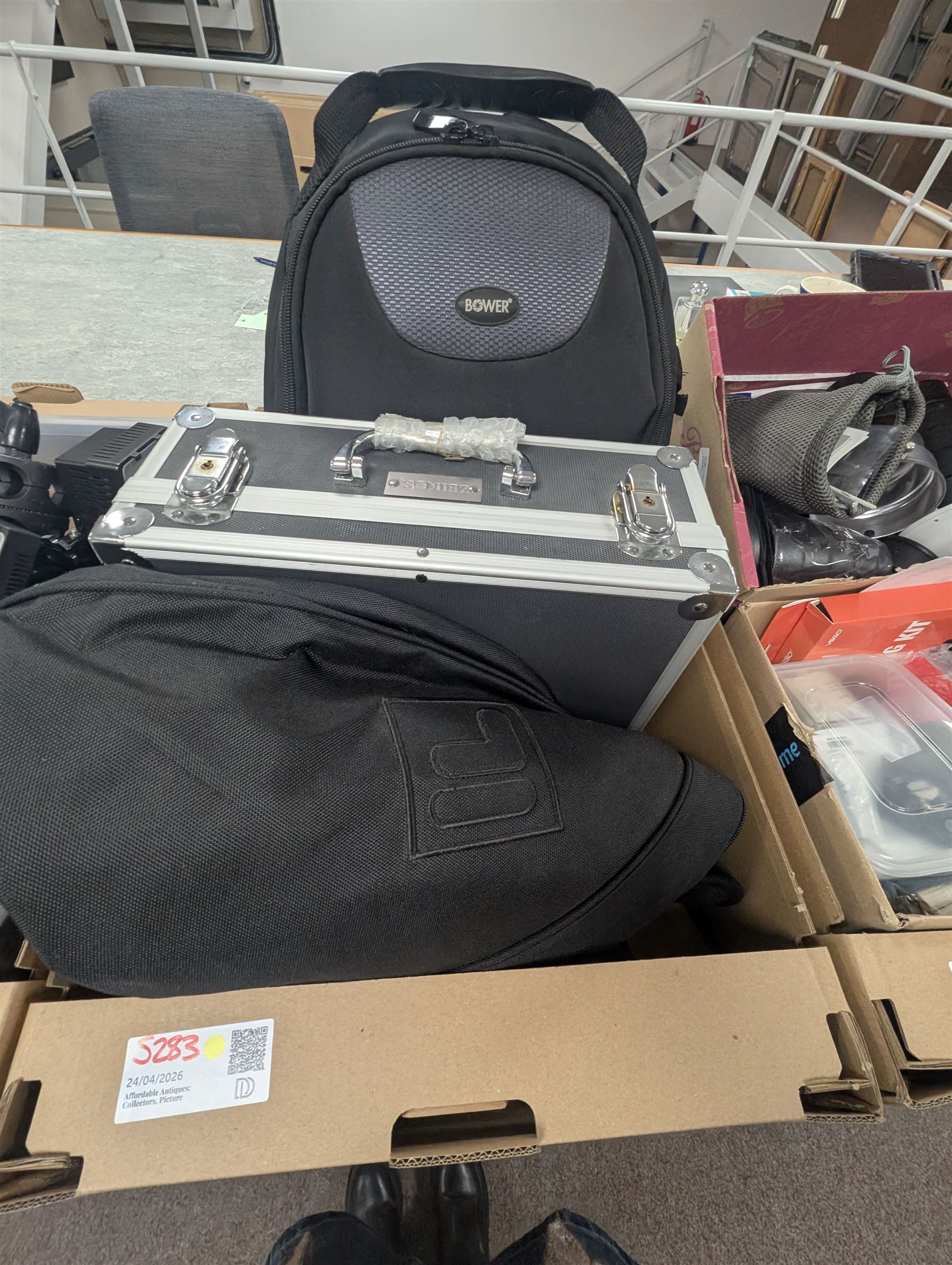 Collection of photography equipment, including flashes, hoods, filters, telephoto lens, bags, etc