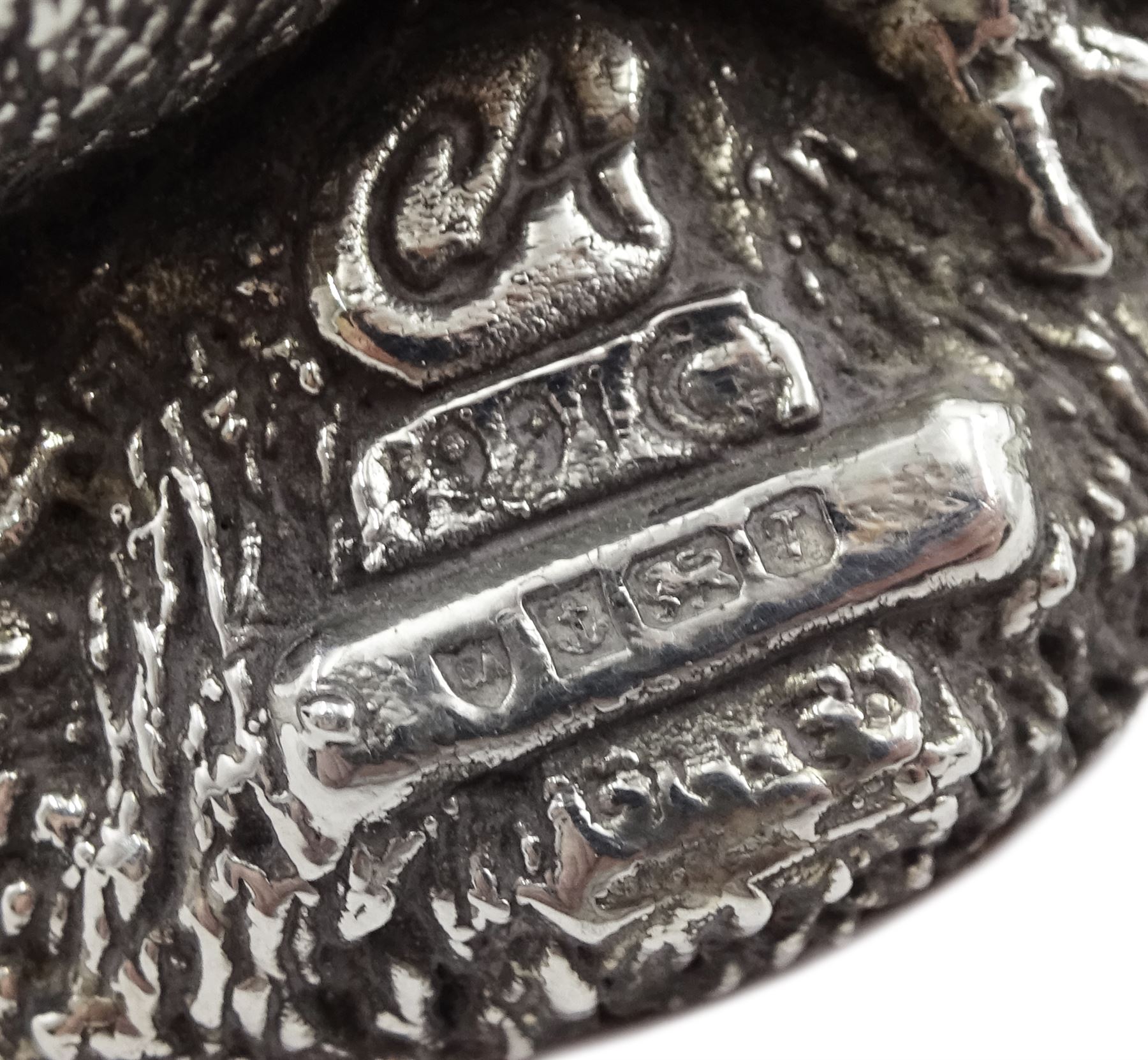 Collection of silver miniatures including a WWI fighter aeroplane the underside of the body engraved 'Bristol' by Italian Medusa Oro 925, gramophone, spinning wheel by S M C, London import marks 1982, sewing machine and chair, all stamped 925 or hallmarked and a silver filled otter by Country Artists