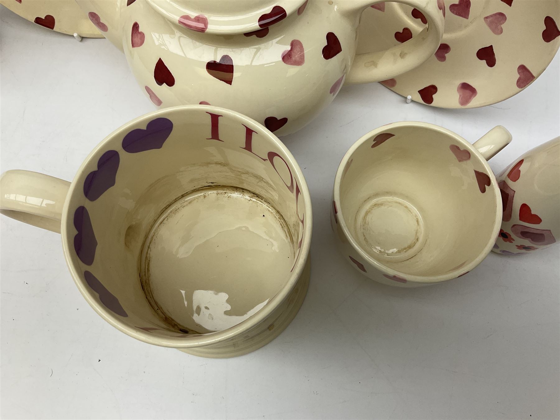 Collection of Emma Bridgewater spongeware ceramics, to include Pink Hearts pattern teapot, milk bottle vase, teacup and saucers, Love & Kisses sugar shaker and large 'I love you more than Marlon Brando' mug, British Birds and Black and White pattern mugs, etc, all with printed marks beneath, tallest H21.5cm