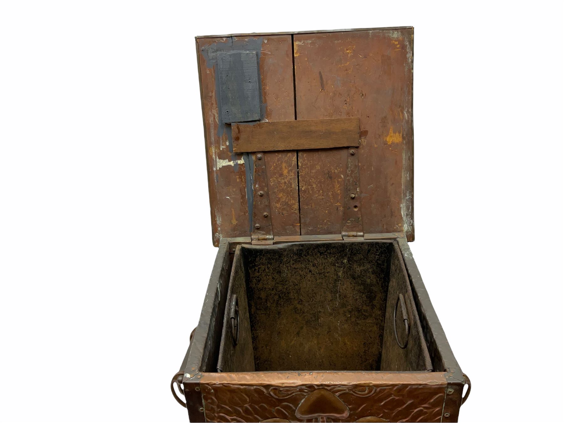 Arts and Crafts copper coal box, of square form with twin curved handles, with hammered finish, and embossed stylised motif to the front and hinged cover, H37cm L40cm D35.5cm