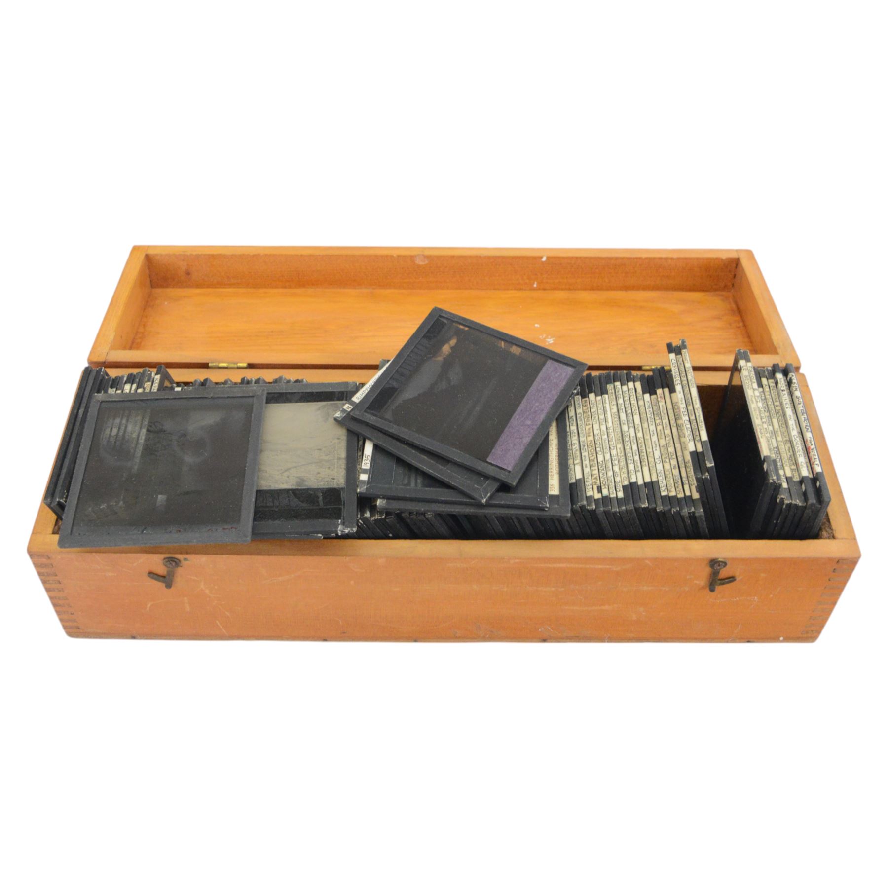 Collection of over 400 magic lantern slides, on various subjects including UK and World travel, orchids, mathematics, geometry, circuitry, religion and prayer