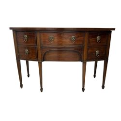 George III mahogany bow-fronted sideboard, mahogany banded top over three drawers and cupboard, fitted with lion mask and hoop handles, on square tapering supports with spade feet