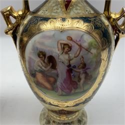 Pair of Vienna style twin handled urns and covers, decorated with figural scene on green, red and white ground with gilt highlights, stamped with beehive mark beneath, H25cm