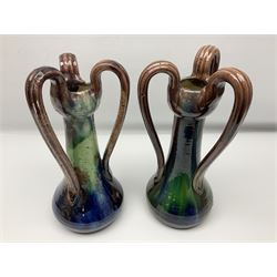 Pair of Art Nouveau style vases, probably Belgian, each with merging blue, brown and green decoration and three handles, impressed LSV beneath, H32cm