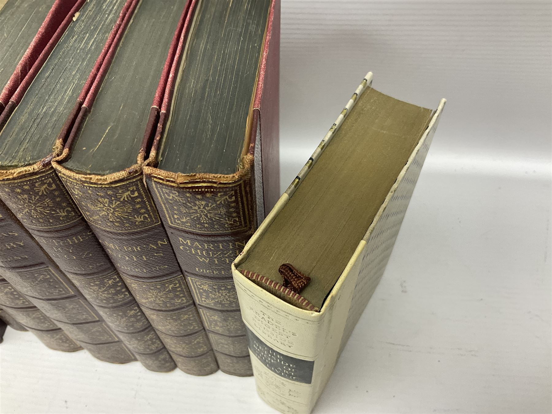 Twenty one volumes of Charles Dickens,  by The Home Library Book company, together with The Readers Digest bedside book of the art of living 