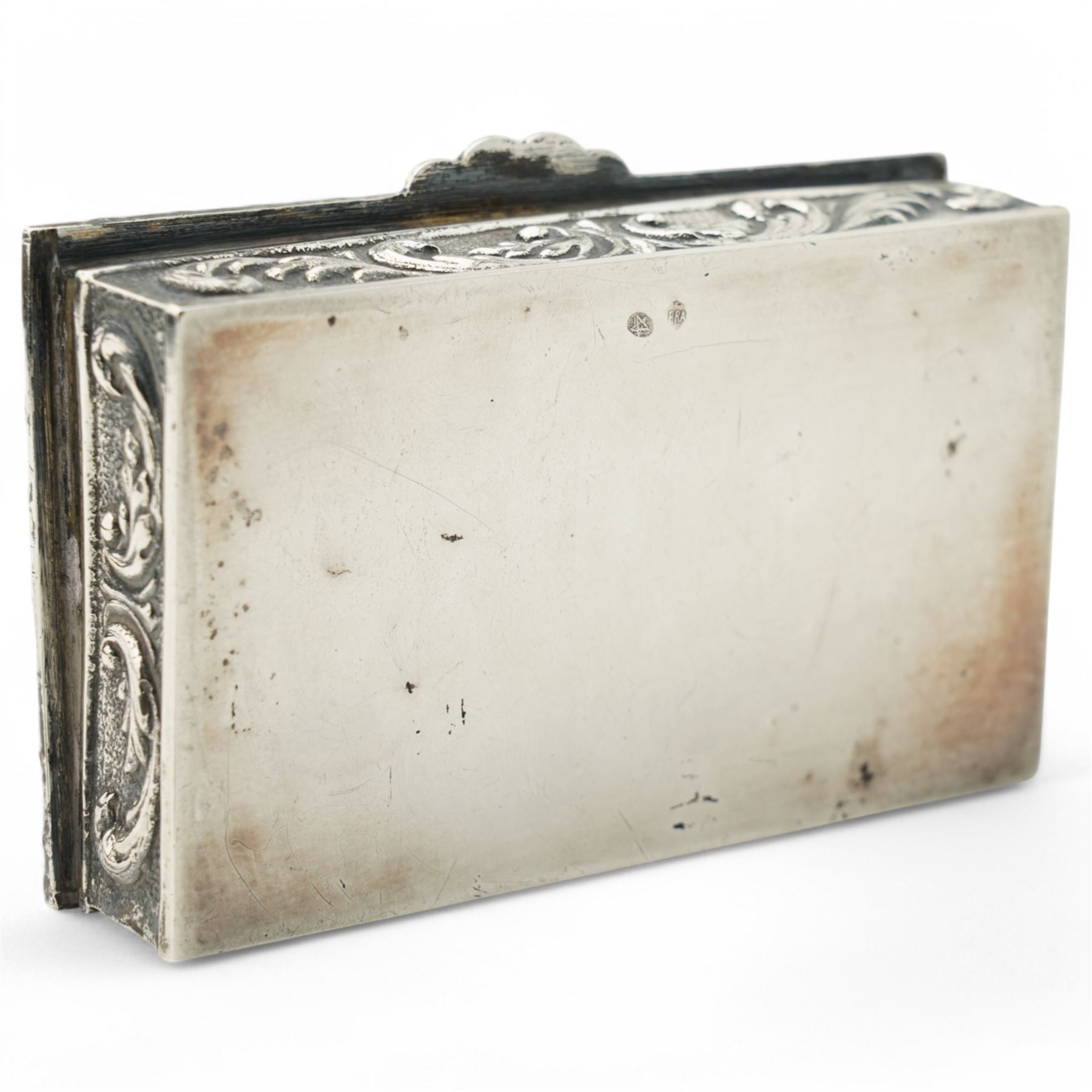 Spanish rectangular silver box, the hinged cover embossed with a hunting scene 9.5cm x 6cm 915 fineness mark and a silver decanter label 'Brandy'
