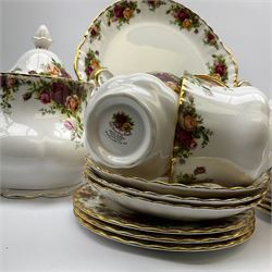 Royal Albert Old Country Roses pattern tea and dinner wares, comprising teapot, six teacups and six saucers, milk jug, open sucrier, cake plate, six dinner plates, six side plates, six bowls, and sauce boat and stand. 