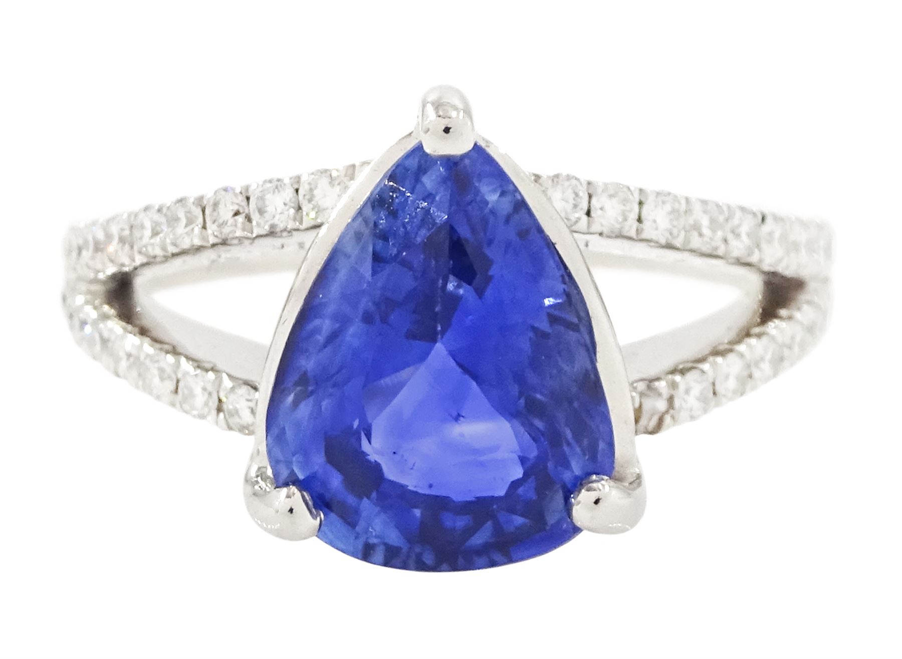 18ct white gold Ceylon sapphire and diamond ring, single pear cut sapphire of approx 2.50 carat, with split round brilliant cut diamond shoulders, stamped 750, total diamond weight 0.33 carat