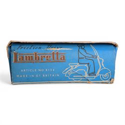 Mettoy friction drive Lambretta scooter no. 8134, the blue plastic scooter with cream handlebars and clear windshield, the rider with cream hat and clothing, stamped MTY 143 to front mud guards, in original box