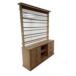 19th century pine dresser, four tier open plate rack above six graduating drawers flanking single shelf, plinth base 
