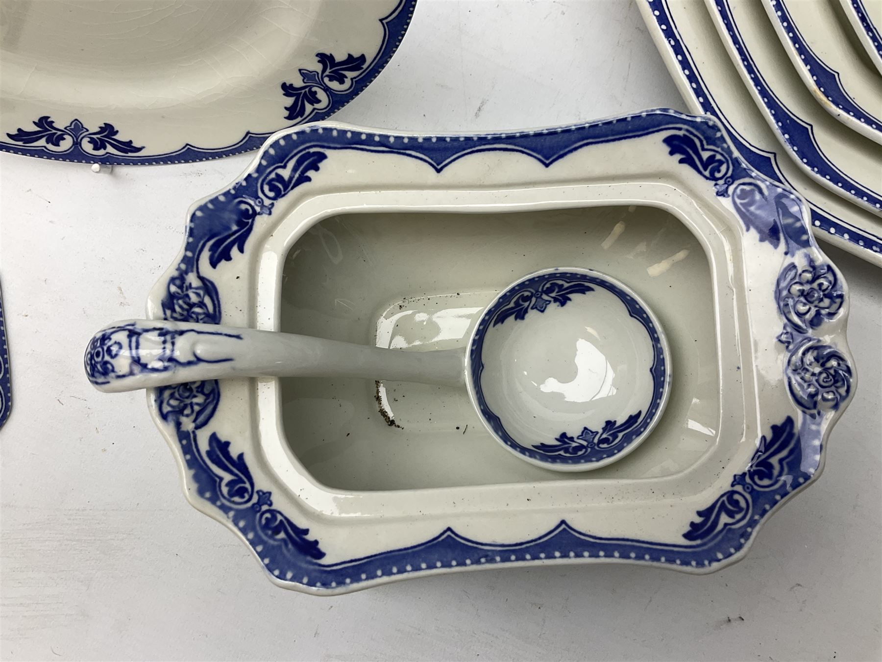 Burgess and Leigh Middleport pottery dinner wares decorated in the ‘Milford’ pattern, to include lidded tureens, graduated meat plates, dinner plates etc 