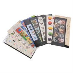 Queen Elizabeth II mint decimal stamps, all first class, mostly in presentation packs, face value of usable postage approximately 560 GBP