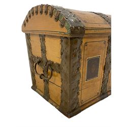 19th century painted oak sea chest, hinged dome top enclosing small compartment, bound by shaped and pressed metal strapwork, scumbled finish to resemble oak and painted with small vignettes depicting portraits and landscapes within panels, fitted with large wrought metal carrying handles, the front inscribed 'H.J.S. 1870' 