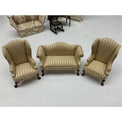 Collection of miniature dolls house furniture, to include five drawer chest painted with blossom, cream and gilt double door mirrored wardrobe, four piece lacquered style desk set, three piece suite, writing desk, wash stand, Knoll style sofa etc (14)